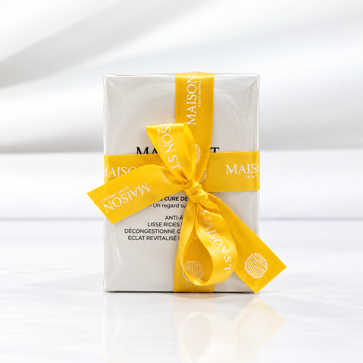 Lot de cinq sachets de patchs yeux OR MAISON ST avec ruban jaune